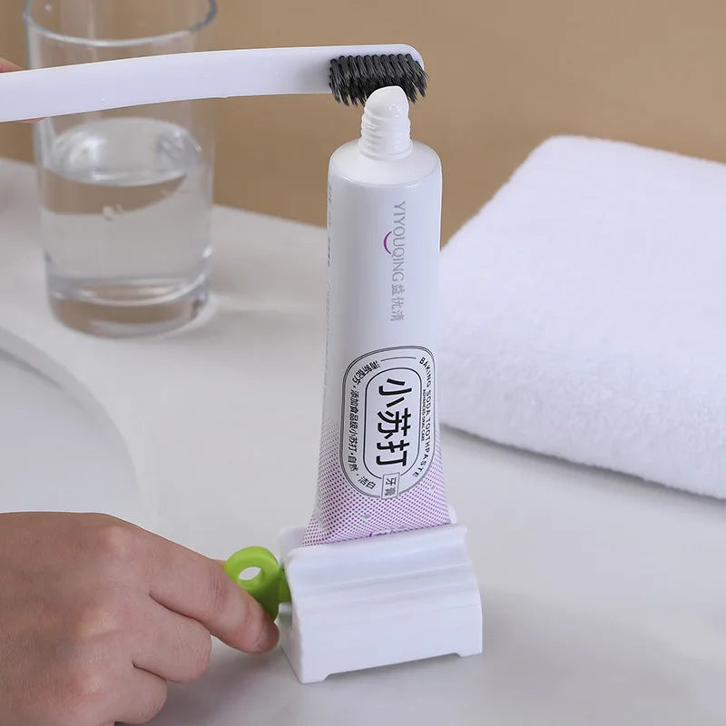 Tooth Paste Squeeze Dispenser Tube Squeezer Facial Cleanser Press Rolling Holder Bathroom Accessories