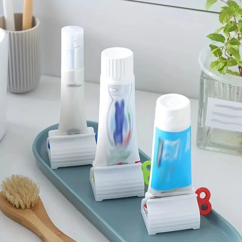 Tooth Paste Squeeze Dispenser Tube Squeezer Facial Cleanser Press Rolling Holder Bathroom Accessories