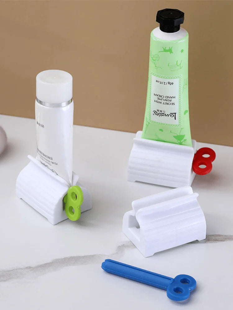 Tooth Paste Squeeze Dispenser Tube Squeezer Facial Cleanser Press Rolling Holder Bathroom Accessories